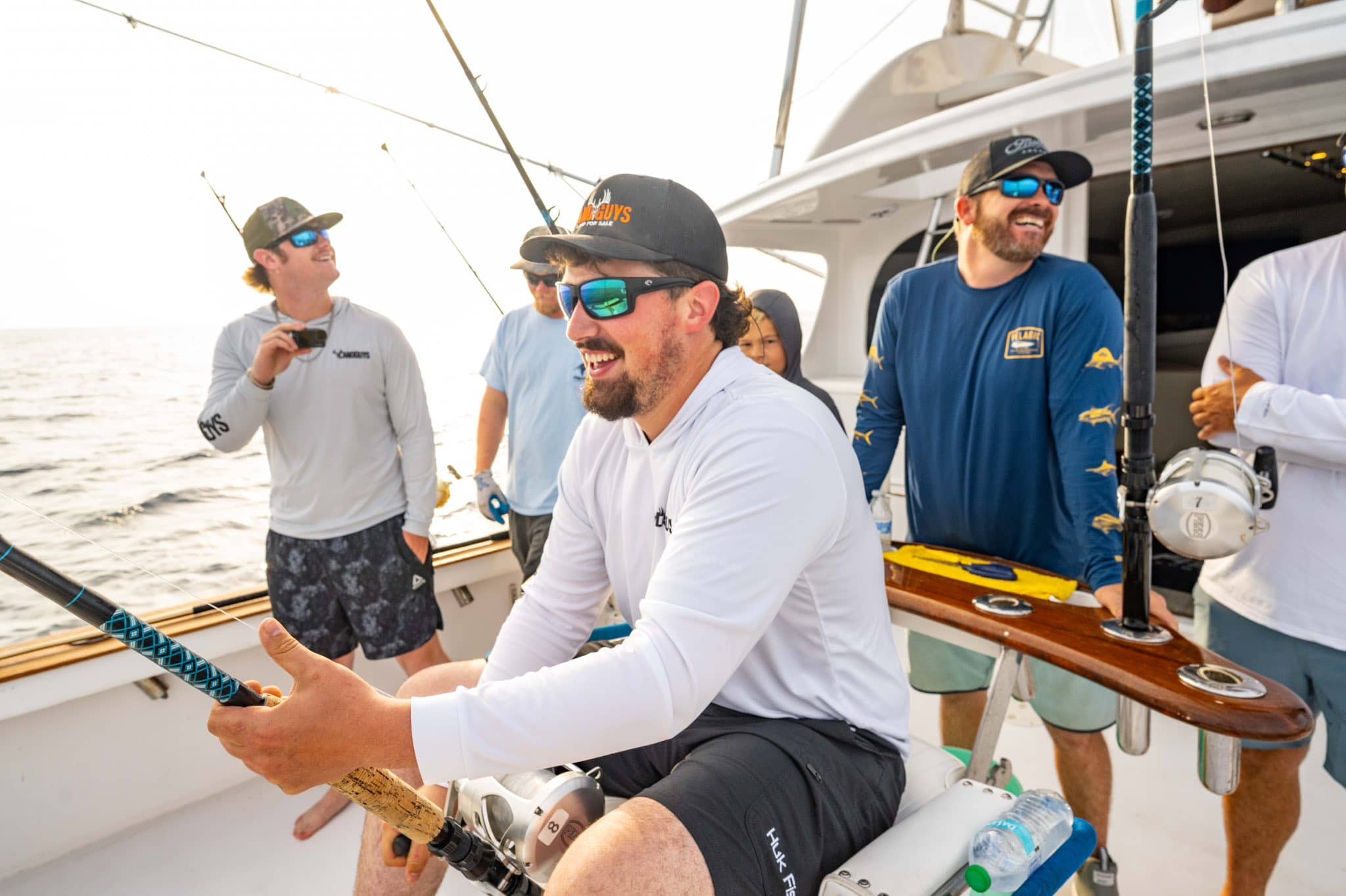 LandGuys client Mitch Gibbs in Outerbanks on his boat with LandGuys IL Broker and Iowa and Missouri Land Agent, Jesse Stay